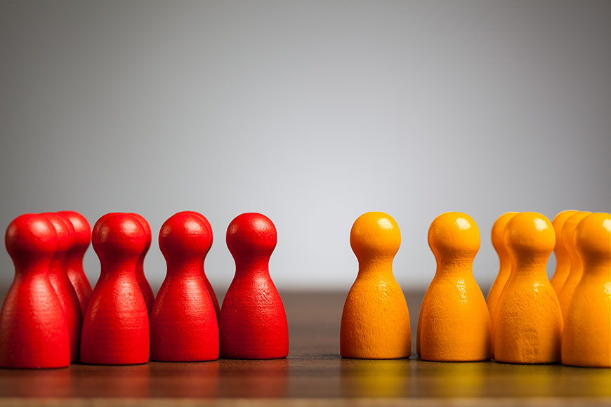 red and orange figures facing each other